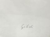 an old picture of a white plate with a writing on it