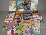 a lot of comic books that are on the table
