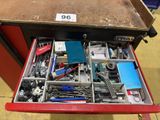 a drawer full of assorted tools in a store