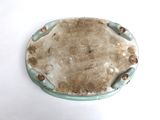 a plate that has a hole in the middle of it