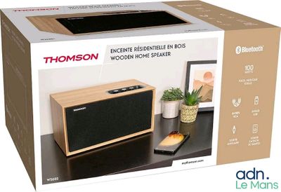 a box with a picture of a wooden speaker on it