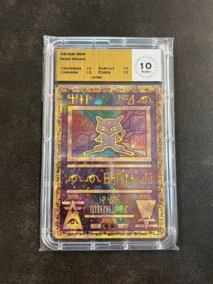 a pokemon trading card in a plastic case on a table