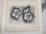 a drawing of two butterflies on a piece of paper
