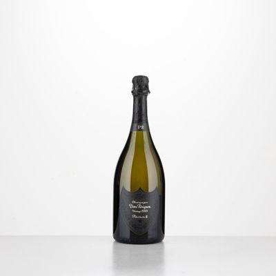 a bottle of champagne sitting on top of a table