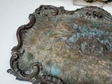 a picture of a metal plate on a table