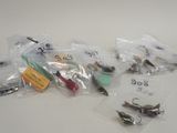 many different types of fishing lures on the table