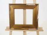 a picture of an easel with a picture on it
