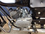 a close up of a motorcycle engine on display