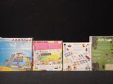 several games are lined up in a row on a black surface