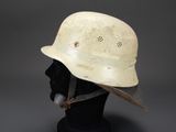 a close up of a helmet on a mannequin head
