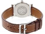 a close up of a watch on a brown leather strap