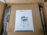 a cardboard box with a picture of a chair inside of it