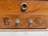 a wooden box that has a number on it