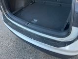 a trunk of a car with the back door open