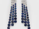 a pair of sapphire and diamond earrings
