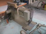 a sewing machine that is sitting on a table