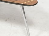 an image of a surfboard shaped coffee table