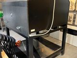 an image of a kitchen with an oven on a stand