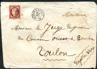 an old envelope with a stamp on it with a picture of a man