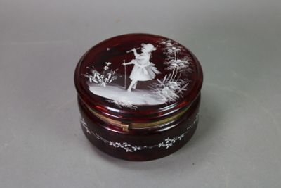 a small glass box with a picture of a woman on it