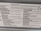 a close up of a label on the back of a refrigerator