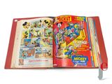mickey mouse comic book opened to show pages of mickey mouse
