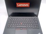 the lenovo laptop is open and ready to be used
