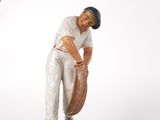 a figurine of a baseball player holding a bat