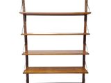 an image of a wooden shelf with four shelves on it