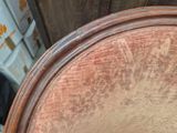 a close up of a brown chair with a brown seat