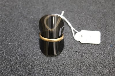 a ring that is sitting on top of a cup