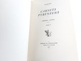 a book that is open on a white surface