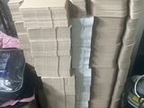 a stack of boxes sitting on top of a pile of luggage