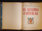 an open book with a picture of a coat of arms and a coat of arms on it