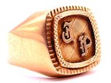 an image of a gold ring with a cross on it