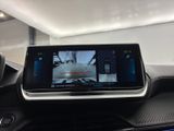 a picture of a car dashboard with a monitor on it