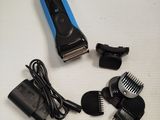 an image of a hair clipper and other accessories on a table