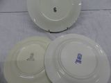 three plates that are sitting on a table