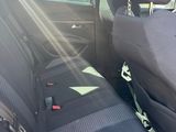 two seats in the back of a car with a bag on the back