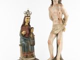 two statues of jesus and a woman with a crown on their heads