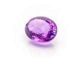 a purple amethorate gems on a white background