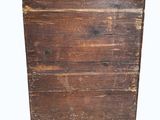an old wooden chest of drawers on a white background