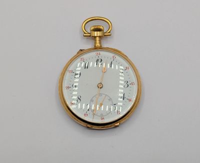 une montre de poche en or avec un cadran blanc sur une surface blanche