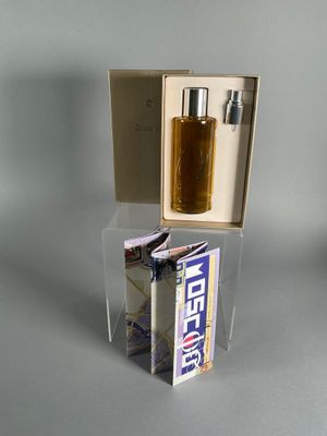 a box with a lighter and a cigarette in it