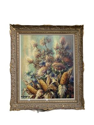 une peinture à l'huile représentant un épi de maïs, dans un cadre doré