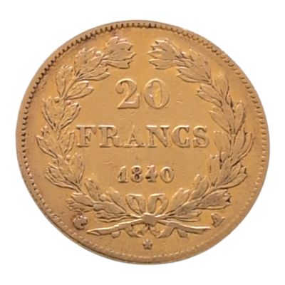 gros plan d'une pièce de monnaie sur une surface blanche