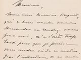 an old black and white photo of a handwritten letter on a piece of paper