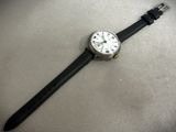 a watch that is laying on a table