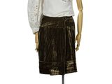 an image of a mannequin dressed in a white top and brown skirt