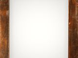 an old wooden picture frame with a white background